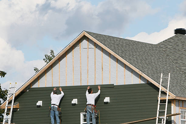 Professional Siding Contractor technician working in Capron, IL
